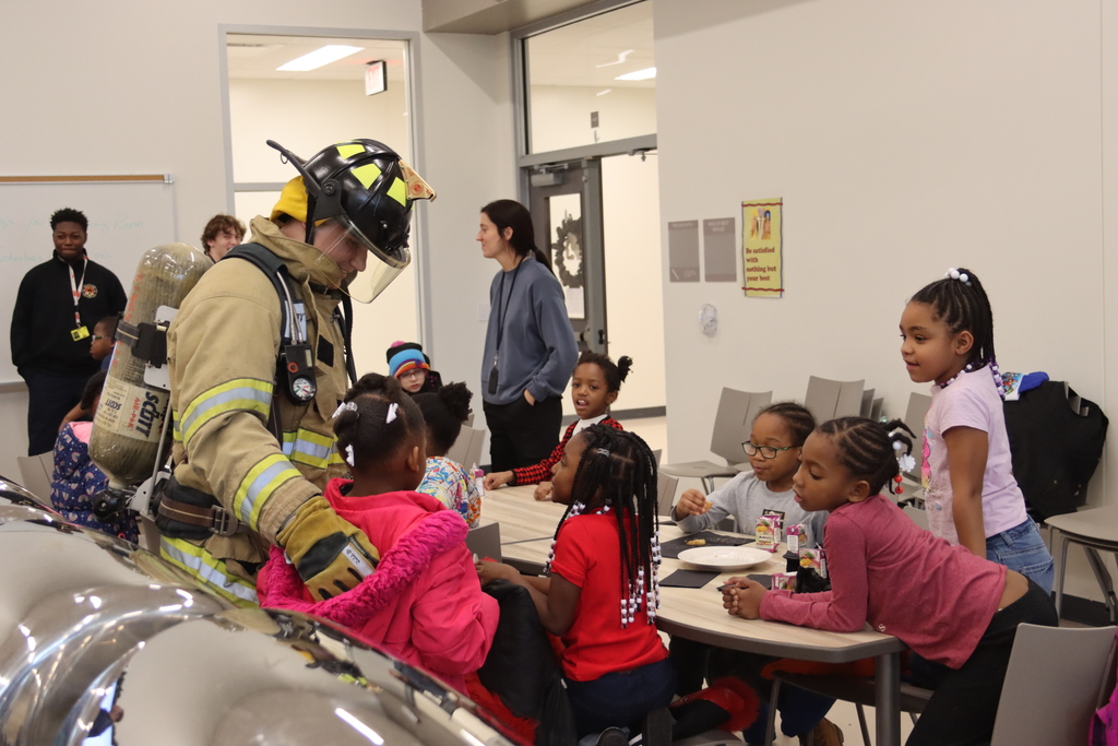 Fire Academy student and elementary students